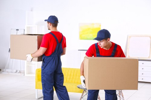 Furniture pick-up team handling bulky household items in Southwark