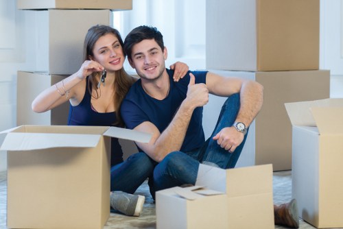 Professional team handling household furniture during a Southwark relocation